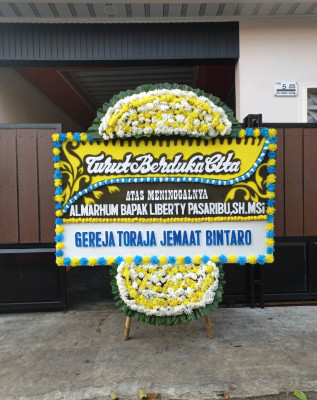 Papan Bunga Duka di Indonesiana